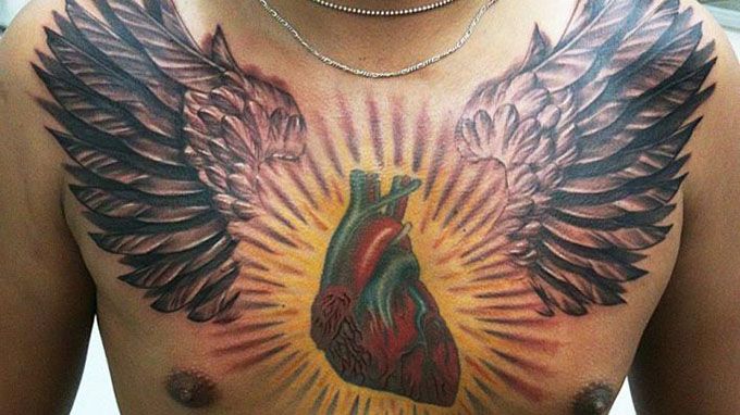 Tattoos-for-Men-on-Chest-heart-with-wings