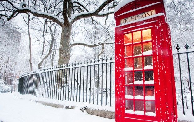 Telephone box in the snow.